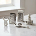 5-in-1 multi-purpose kitchen gadget set on marble surface